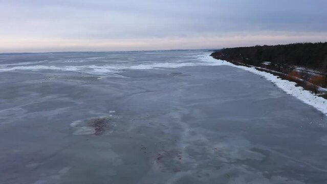Frozen Bay of Puck near Kuznica at sunset, Hel Peninsula. Poland