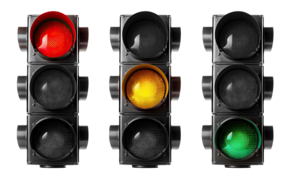 Trio of vertical traffic lights displaying red, yellow, and green signals, cut out - Powered by Adobe