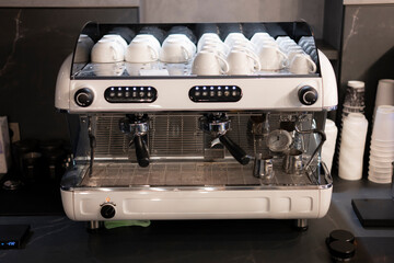 Sleek Modern Professional Coffee Machine Equipped for Barista Craft in a Contemporary Cafe Setting