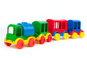Children's toy, a multi-colored steam locomotive on a white background.