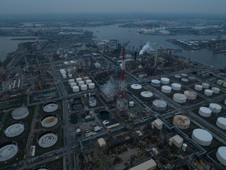 Oil refinery in the port of Antwerp, Belgium. processing, refining and petrochemical production. Petroleum products are made here. Large industrial installation at night.