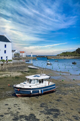 Sauzon in Brittany, the typical harbor with boats and lighthouse
- 783275292