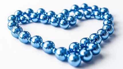 Obraz premium Heart made out of blue beads, perfect for romantic concepts and love themes