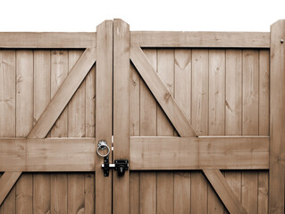 Wooden gates on driveway with lock and drop bolts