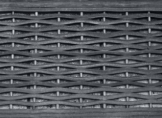 A rubber mat pattern closeup in black and white