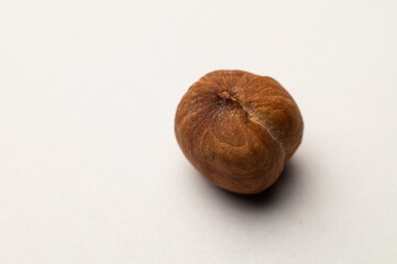 Hazelnut. Fresh organic peeled hazelnuts on a white background. Macro shot of a nut