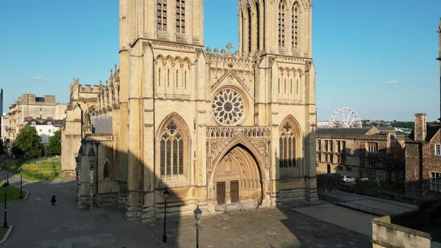 Drone shot of the Statue of Ram Mohan Roy and Bristol Cathedral in the city of Bristol, England, UK