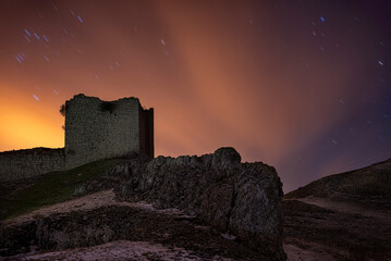 Night view of the ruins of the medieval castle of Monasterio de Rodilla, Burgos, in the region of...
