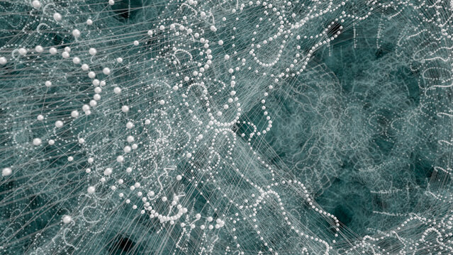 A white grid with small spheres in a dark space.