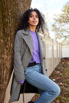 Model Wearing Wool Coat and purple sweater