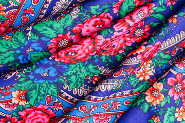 Blue Russian winter scarf with vivid floral design.