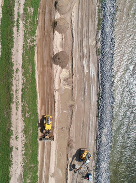 Overhead aerial shot of Dutch dyke or dike construction