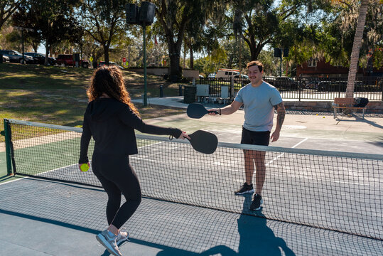 Pickleball paddle tapping