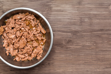 Food for animals background. wet cat and dog food texture, pattern. Pet meal background close up. wet food for pet dogs and cats. Dried pet food top view. Granules of good nutrition for dogs and cats.