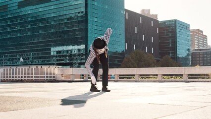 Mime, city and man with creative, artist and performance with busk and skills with talent. New York, sunshine and performer with body motions and acting out a story with a scene, comedy or urban town