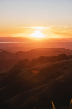 Vertical image of a sunset in the mountains