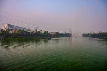 Tranquil Dawn Over Dhaka's Urban Waterways