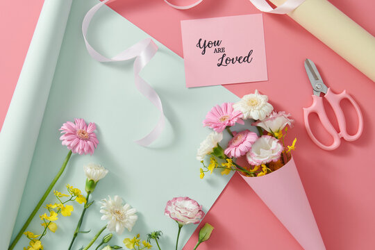 Valentine's day background with pink flowers and gifts