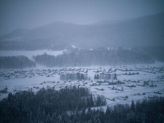 Serene Village in Snowy Night