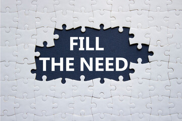 Fill the need symbol. Concept word Fill the need on white puzzle. Beautiful deep blue background. Business and Fill the need concept. Copy space