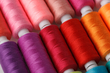 Set of colorful spools of thread