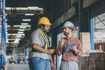 Warehouse worker working in warehouse storage. Foreman or worker work at factory site check up products in site. Inventory worker working in  factory Storehouse