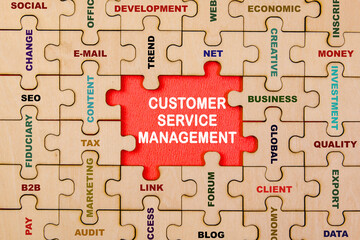 Customer Service Management concept Words Customer Service Management on jigsaw puzzle