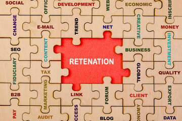 Retention word on jigsaw puzzle business concept image with word RETIREMENT
