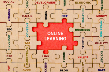 Online learning concept with jigsaw puzzle pieces and word Online Learning