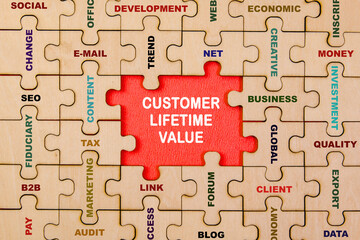 Customer Lifetime Value puzzle business concept image with word Customer Lifetime Value
