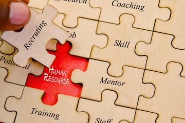 Jigsaw puzzle pieces with the missing piece conceptual image of Human Resource