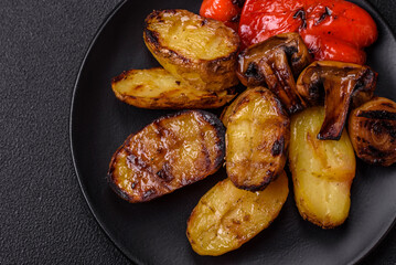 Delicious juicy grilled vegetables potatoes, tomatoes, peppers, eggplant