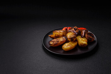 Delicious juicy grilled vegetables potatoes, tomatoes, peppers, eggplant