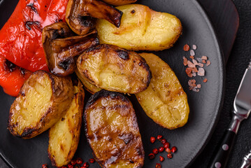 Delicious juicy grilled vegetables potatoes, tomatoes, peppers, eggplant