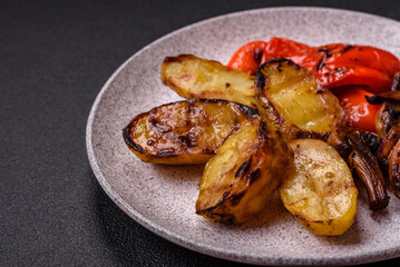 Delicious juicy grilled vegetables potatoes, tomatoes, peppers, eggplant
