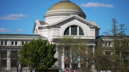 Smithsonian Museum of Natural History in Washington, DC with a clear blue sky on a spring day.