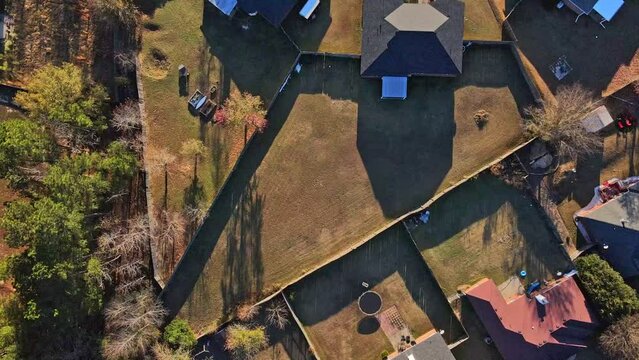 Aerial top down of cul de sac in Euchee Creek Trails suburban neighborhood during Fall in Grovetown Augusta Georgia
