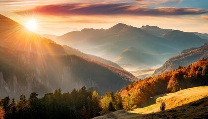 the dawn s early rays transform the autumnal mountain landscape