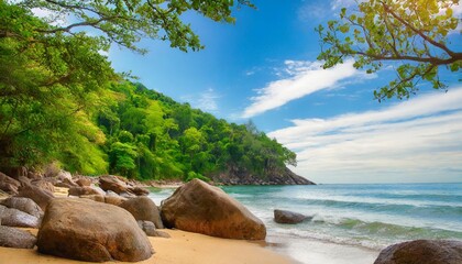 relaxing scenic beach spring summer by green foliage of trees and rocks view on seaside