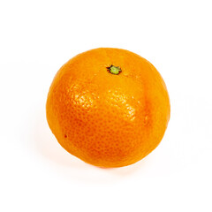 Closeup of a ripe mandarin orange isolated on white background