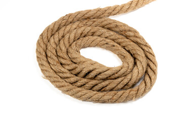 Closeup of a rolled piece of rope isolated on white background