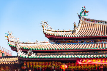 Roof sculpture of Tianhou Palace in Quanzhou, Fujian, China Ancient pagoda of Kaiyuan Temple in Quanzhou