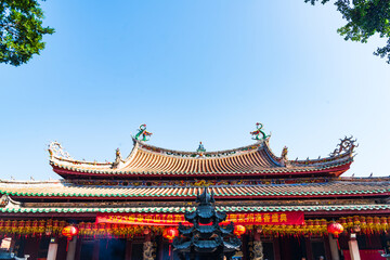 Roof sculpture of Tianhou Palace in Quanzhou, Fujian, China Ancient pagoda of Kaiyuan Temple in...