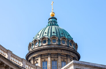 Dome of the Kazan Cathedral with golden religious cross against a sky in St. Petersburg, Russia - 783370661