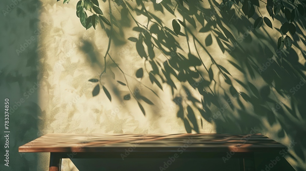Poster empty table and darkgreen wall. table with sun reflections and leaves shadows on beige wall. backgro