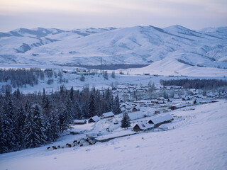 Snow-Covered Village in the Mountains