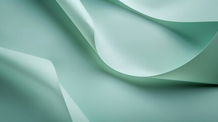 Abstract green paper waves on a light background. Macro shot with soft focus and waves concept. Modern design backdrop with smooth lines and curves.