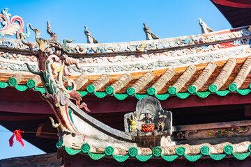 Roof sculpture of Tianhou Palace in Quanzhou, Fujian, China Ancient pagoda of Kaiyuan Temple in Quanzhou