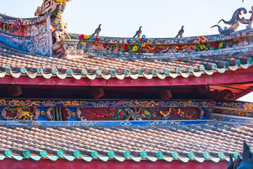 Roof sculpture of Tianhou Palace in Quanzhou, Fujian, China Ancient pagoda of Kaiyuan Temple in...