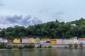Panoramic view of colorful row of houses at river Danube, Passau, Bavaria, Germany. High quality photo